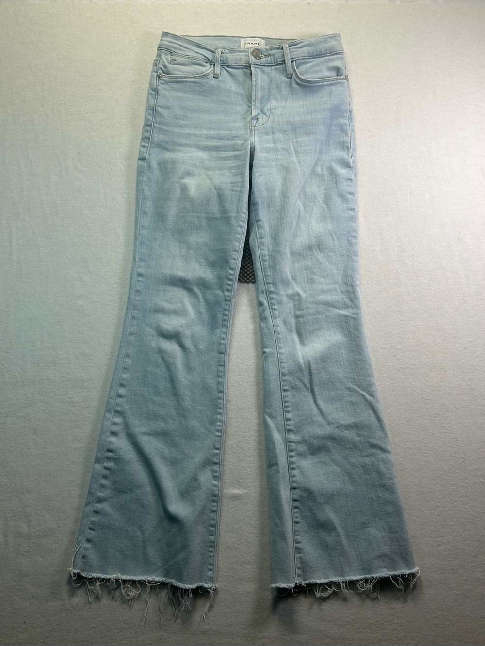 Frame Denim Light Blue Flare Jeans with Frayed Hem